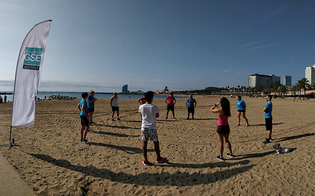 crossfit on the beach with alumni and faculty