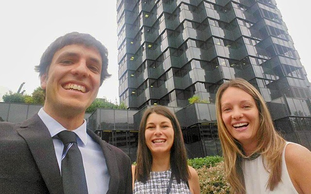 Alumni at Caixabank Research share insights on labor markets, Millenials, and more Alumni in front of Caixabank
