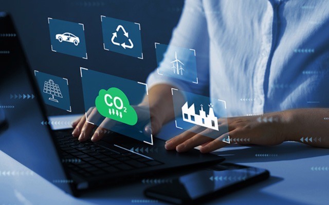 Analyst evaluating policy or actions for decreasing CO2 output Depiction of analyst evaluating policy or actions for decreasing CO2 output