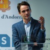 Ben Golub speaks at a podium during the Prize lecture in Barcelona