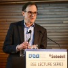 Robert Porter speaks from a lectern during the 46th BSE Lecture in Barcelona